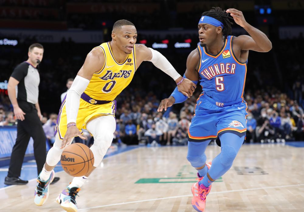 Los Angeles Lakers guard Russell Westbrook (0) drives to the basket as Oklahoma City Thunder forward Luguentz Dort (5) defends during the second quarter at Paycom Centre, Oklahoma October 27, 2021. u00e2u20acu2022 Reuters pic