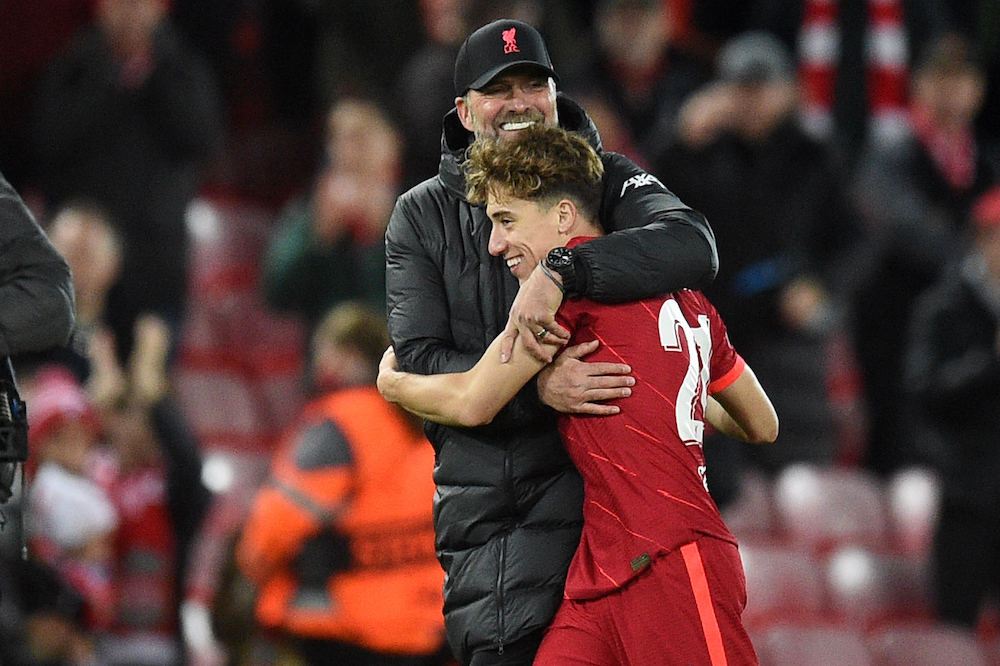 Liverpool manager Jurgen Klopp hugs defender Kostas Tsimikas after the Uefa Champions League group B match between Liverpool and Atletico Madrid in Liverpool November 4, 2021. u00e2u20acu201d AFP pic