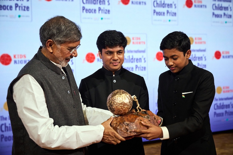 Nobel Peace Prize winner 2014 Kailash Satyarthi presents the International Children's Peace Prize 2021 to Vihaan and Nav Agarwal from India in The Hague November 13, 2021. u00e2u20acu201d AFP pic