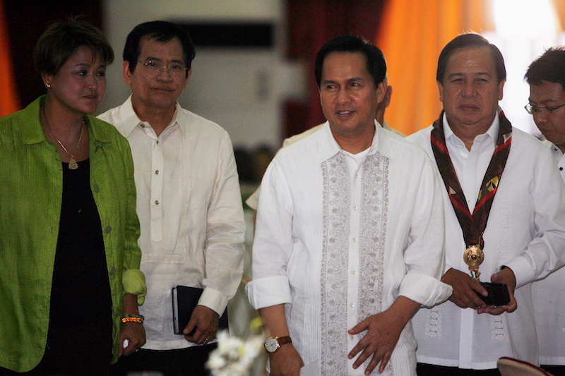 International evangelist Pastor Apollo Quiboloy (2nd right) walks with presidential candidates attending his 60th birthday celebration in Davao City, southern Philippines April 25, 2010. u00e2u20acu201d Reuters pic