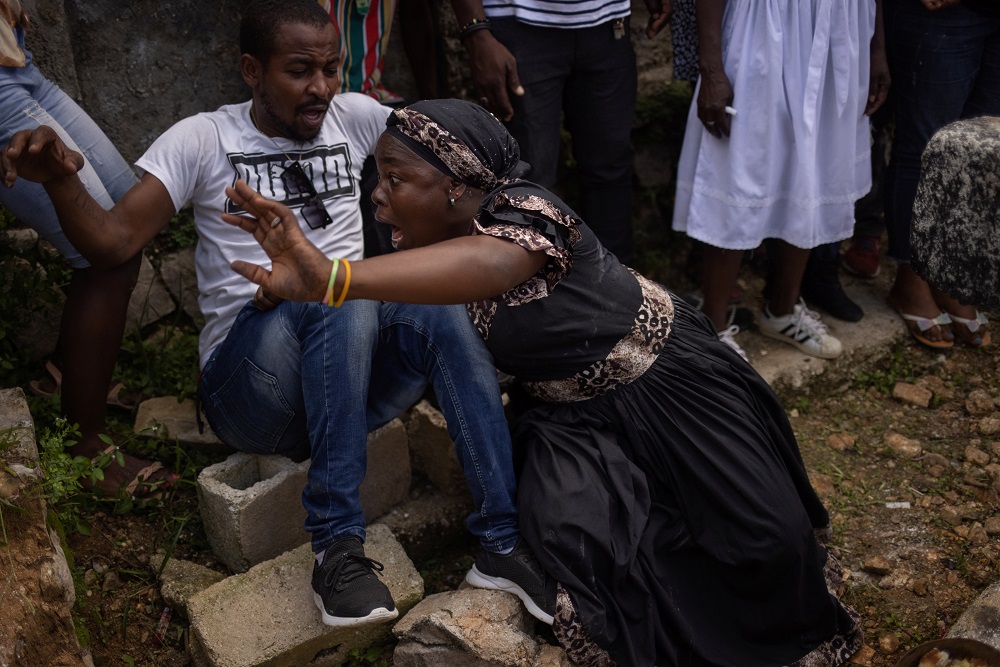A woman, possessed by a spirit, goes into a trance as she takes part in a voodoo ceremony during the Day of the Dead celebrations in the Petionville neighborhood of Port-au-Prince, Haiti November 2, 2021. u00e2u20acu201d Reuters pic