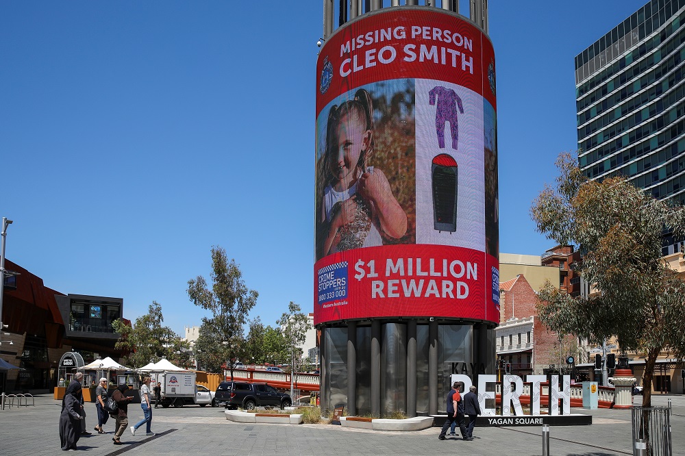 A sign offering a US$1 million reward for information on missing girl Cleo Smith is displayed on a digital tower in Perth October 30, 2021. u00e2u20acu201d AAP Image/Richard Wainwright via Reuters 
