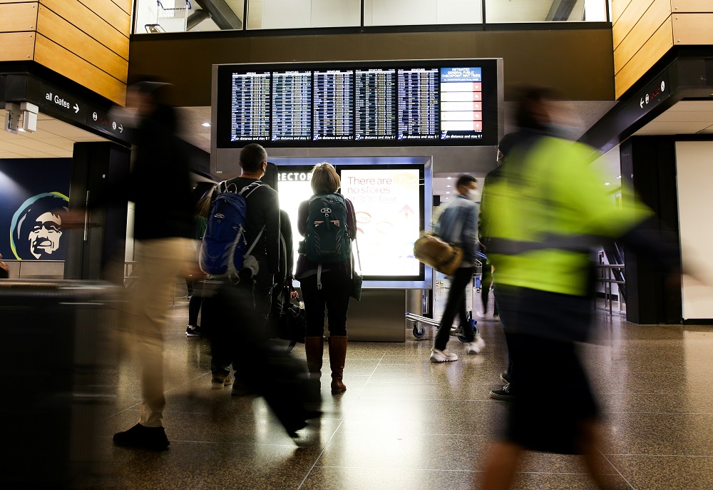 Travellers check a departures list at the ticketing level of Seattle-Tacoma International Airport before the Thanksgiving holiday in Seattle November 24, 2021. u00e2u20acu201d Reuters pic