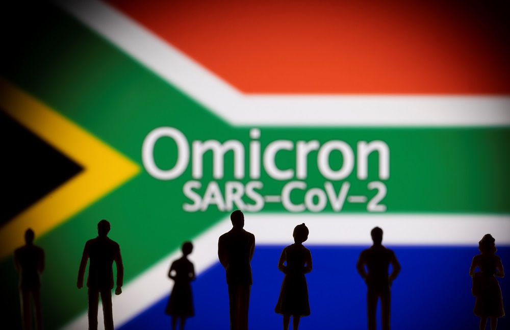 Small toy figures are seen in front of a displayed South Africa flag and words u00e2u20acu02dcOmicron SARS-CoV-2u00e2u20acu2122 in this illustration taken, November 27, 2021. u00e2u20acu201d Reuters pic