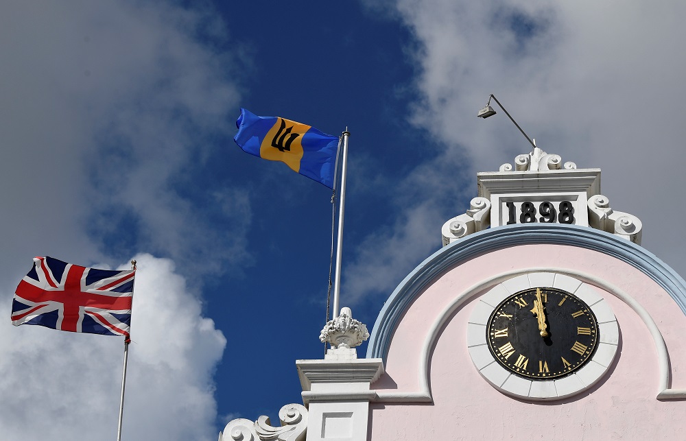 The British Union flag and the national flag of Barbados fly next to each other on a building as preparations take place to mark the Caribbean islandu00e2u20acu2122s transition to a republic, in Bridgetown, Barbados November 29, 2021. u00e2u20acu201d Reuters pic