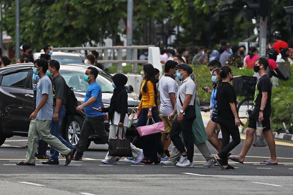 Among the new infections recorded on Sunday, 719 were in the community, 25 were residents of migrant worker dormitories and the remaining three were imported. u00e2u20acu201d TODAY pic