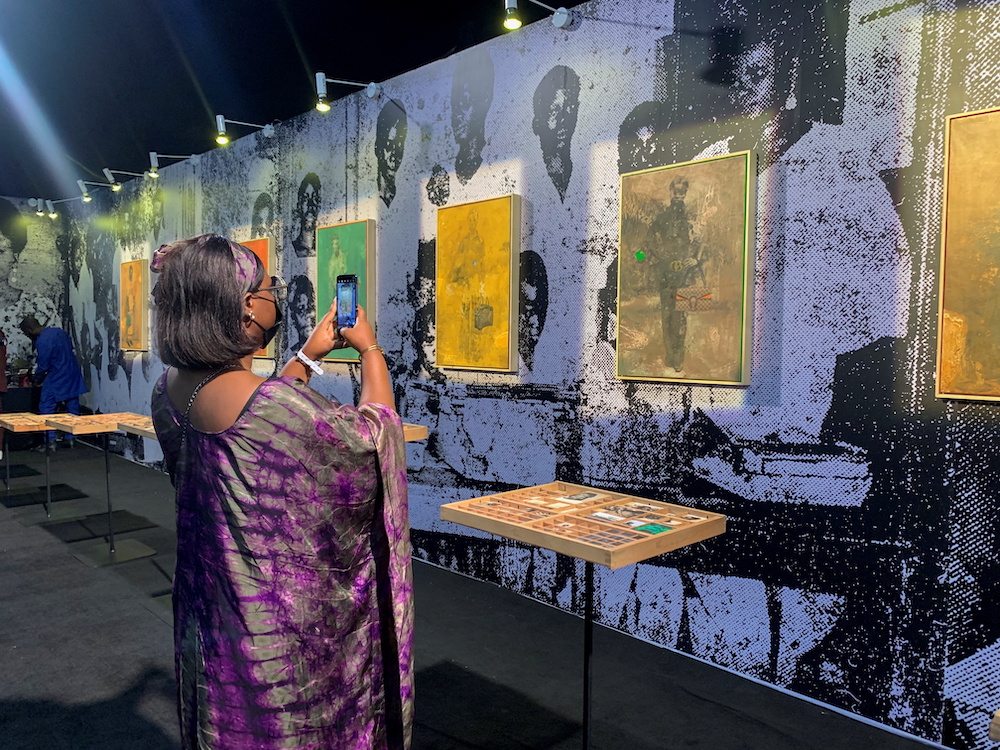 A visitor takes a picture of an art piece displayed at the ART X fair in Lagos, Nigeria, November 5, 2021. u00e2u20acu201d Reuters pic
