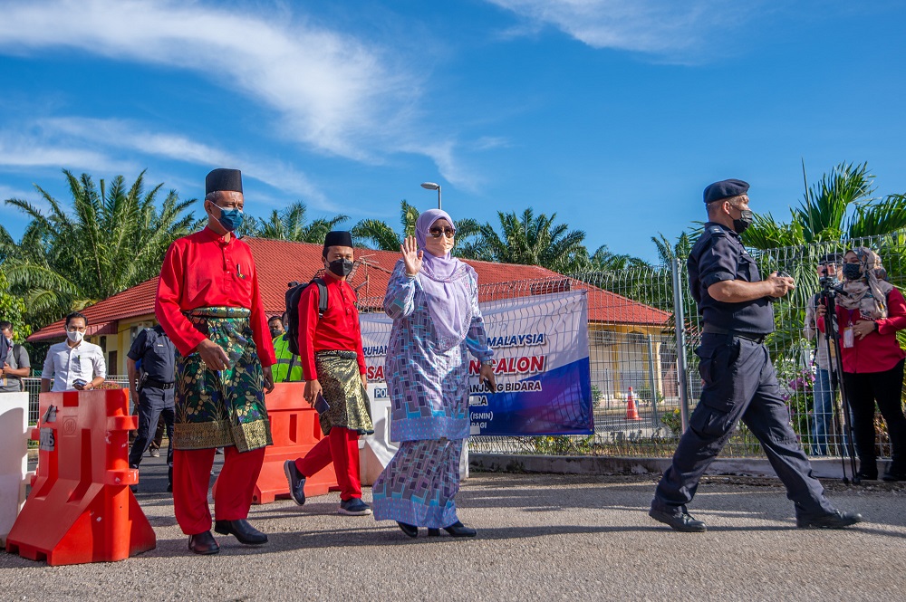 Perikatan Nasional’s Tanjung Bidara candidate Datuk Mas Ermieyati Samsudin (centre) arrives at the nomination centre for the Melaka state by election in Tanjung Bidara, Melaka November 8, 2021. 
