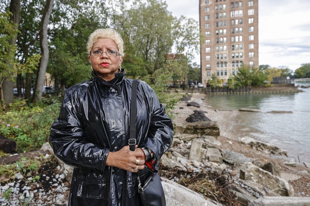 Jera Slaughter stands outside her high-rise apartment building impacted by erosion from Lake Michigan, in Chicago, Illinois October 14, 2021. — AFP pic