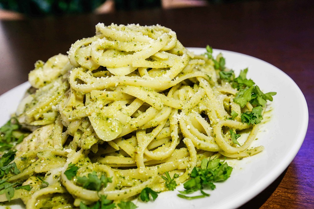 The chicken pesto fettuccine is a rich, creamy dish made of basil and pine nuts with a generous amount of chicken in it. 