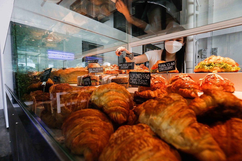 Customers are able to select from a variety of breads at the new Crumbz Cafe located here at City Junction, Tanjung Tokong. 