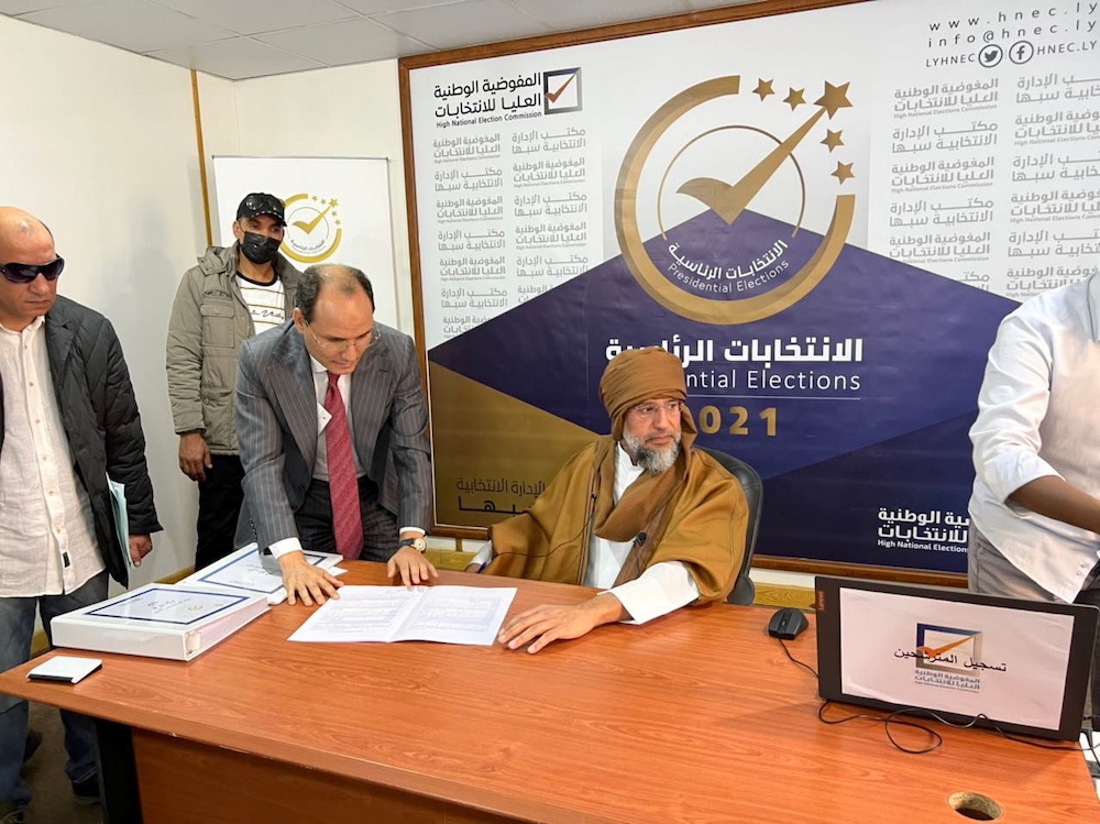 Saif al-Islam al-Gaddafi, son of Libya's former leader Muammar al-Gaddafi, registers as a presidential candidate for the December 24 election, at the registration centre in the southern town of Sebha, Libya November 14, 2020. u00e2u20acu201d Khaled Al-Zaidy handout v