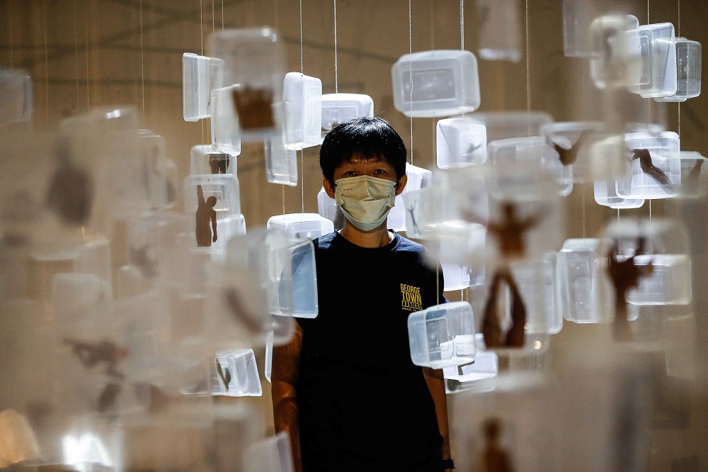 Tan Lay Heong pictured here with her art installation titled 'Between 01.' 