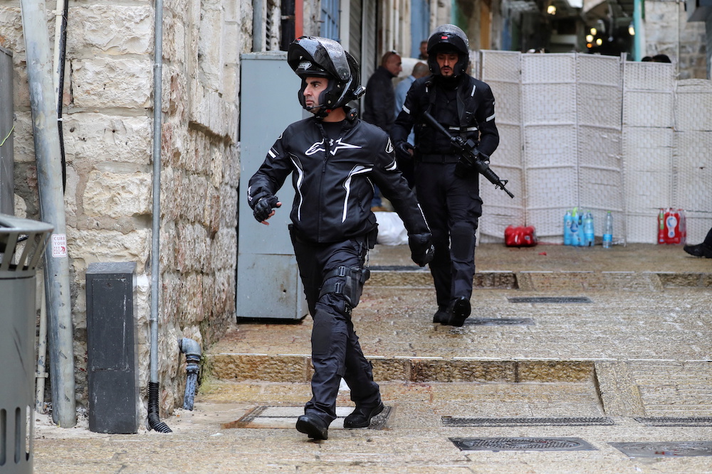 Israeli police officers patrol the site of a shooting incident in Jerusalem's Old City November 21, 2021. u00e2u20acu201d Reuters picnn