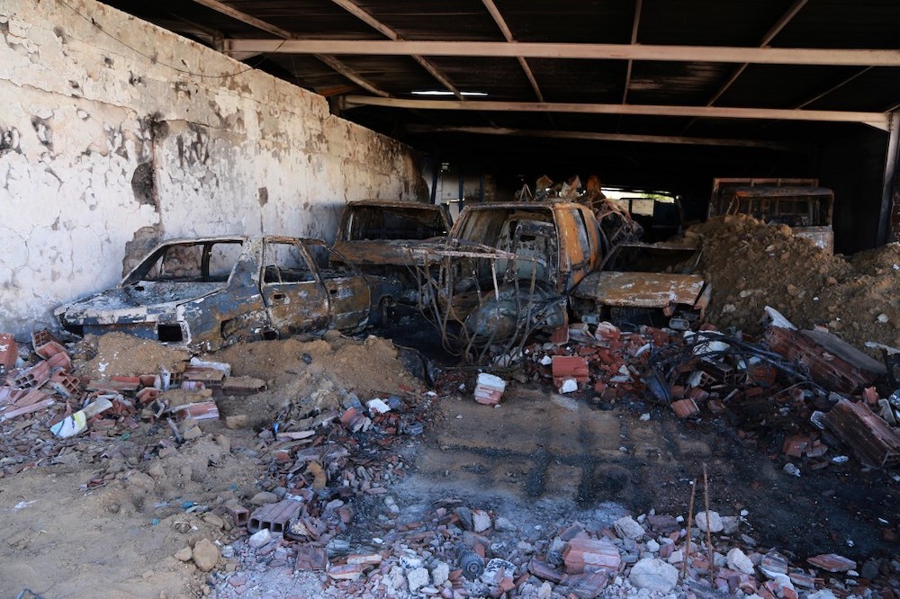 Burned cars set on fire the previous night in the Tunisian town of Agareb in the central region of Sfax are pictured on November 11, 2021. ― AFP pic