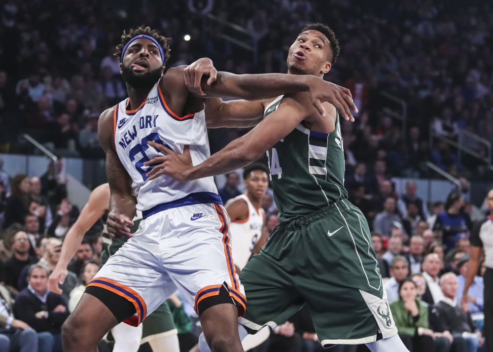 nNew York Knicks centre Mitchell Robinson (23) and Milwaukee Bucks forward Giannis Antetokounmpo (34) battle for a rebound in the first quarter at Madison Square Garden, New York November 10, 2021. u00e2u20acu201d Reuters picn