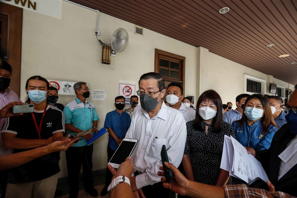 DAP secretary-general Lim Guan Eng speaks to reporters at the Penang High Court in George Town November 22, 2021. u00e2u20acu201d Picture by Sayuti Zainudin