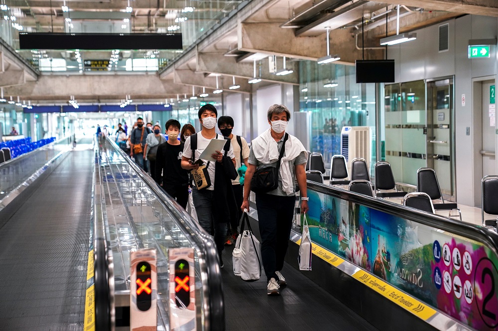 Foreign tourists arrive at Suvarnabhumi Airport during the first day of the country's reopening campaign, part of the government's plan to jump start the pandemic-hit tourism sector in Bangkok, Thailand November 1, 2021. u00e2u20acu2022 Reuters file pic