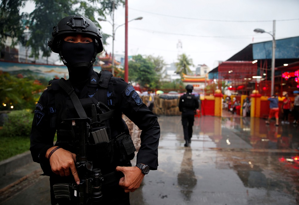 An anti-terror policeman stands guard as a security sweep is conducted during Chinese New Year celebrations at a temple in Chinatown in Jakarta, Indonesia, February 16, 2018. u00e2u20acu2022 Reuters file pic