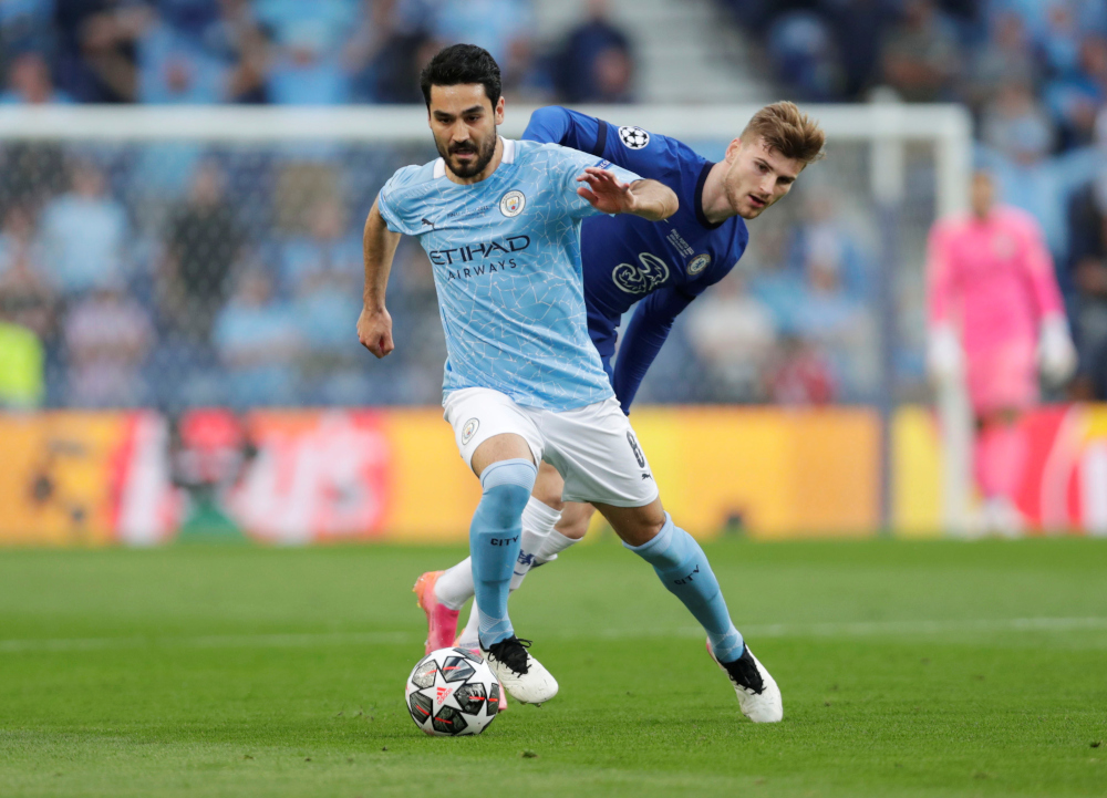 Manchester Cityu00e2u20acu2122s Ilkay Gundogan in action with Chelseau00e2u20acu2122s Timo Werner during the Champions League final at Estadio do Dragao, Porto, Portugal, May 29, 2021. u00e2u20acu201d Reuters picnn