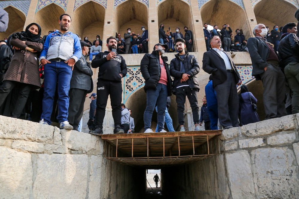 Iranians gather during a protest to voice their anger after their province's lifeblood river dried up due to drought and diversion, in the central city of Isfahan, on November 19, 2021. u00e2u20acu201d AFP pic