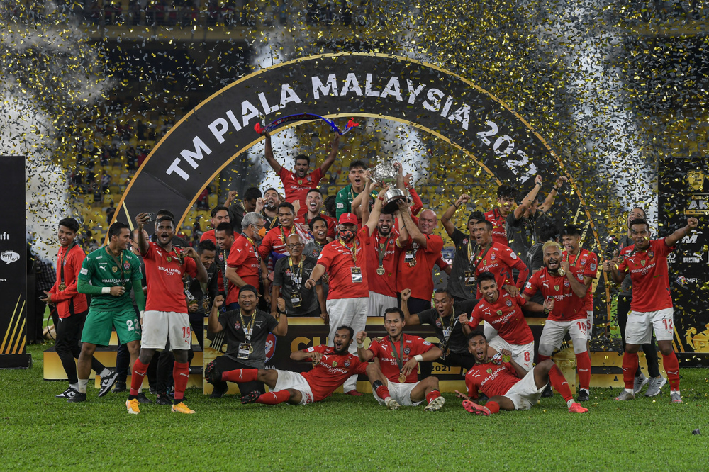 Kuala Lumpur City FC celebrate their Malaysia Cup win with KL City president Tan Sri Annuar Musa, the management and training personnel, November 30, 2021. u00e2u20acu201d Bernama pic  