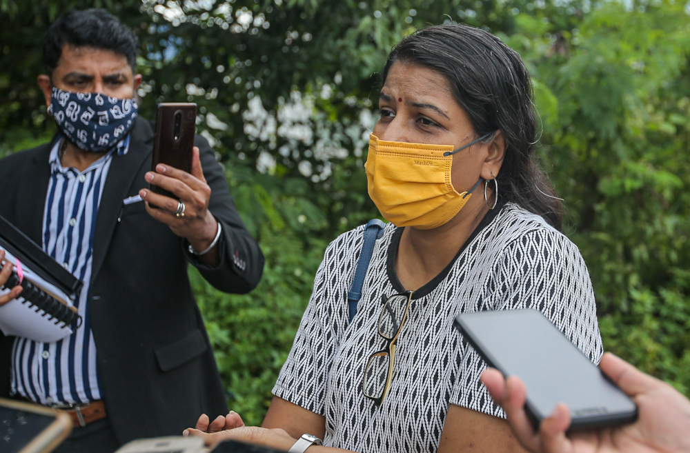 M. Indira Gandhi speaks to the press at the Ipoh police district headquarters November 18, 2021. — Picture by Farhan Najib