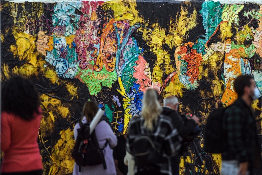 People visit US artist Mark Bradford's exhibition u00e2u20acu02dcAGORAu00e2u20acu2122 at the Serralves Museum of Cotemporary art Art in Porto, north of Portugal, on November 25, 2021. u00e2u20acu201d AFP picnn