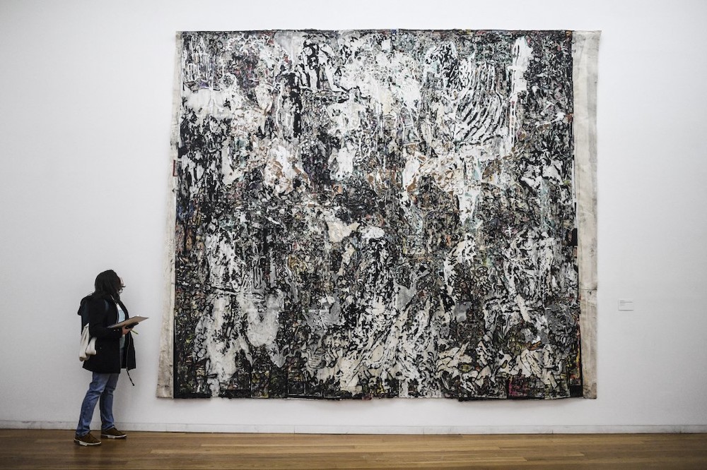 People visit US artist Mark Bradford's exhibition ‘AGORA’ at the Serralves Museum of Cotemporary art Art in Porto, north of Portugal, on November 25, 2021. — AFP pic