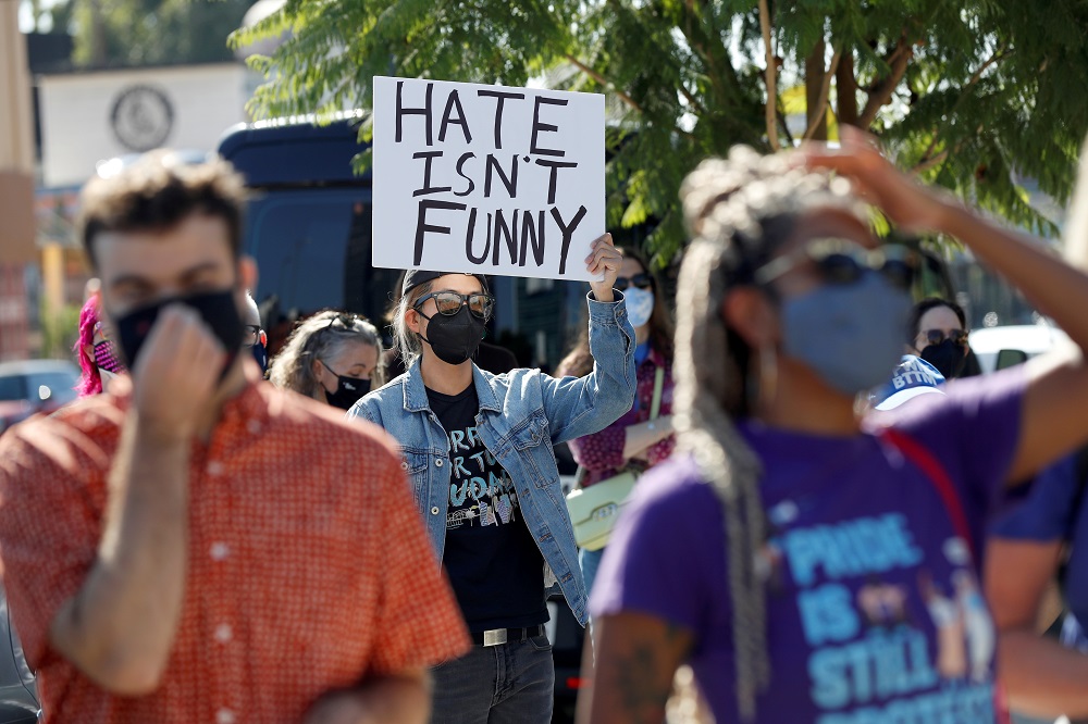 People attend a rally in support of the Netflix transgender employee walkout 'Stand Up in Solidarity' to protest the streaming of comedian Dave Chappelle's new comedy special, in Los Angeles, October 20, 2021. u00e2u20acu2022 Reuters file pic