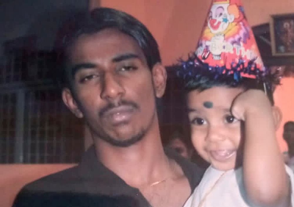 An undated handout photo shows Nagaenthran Dharmalingam holding his nephew in Ipoh, Malaysia. u00e2u20acu201d Reuters pic