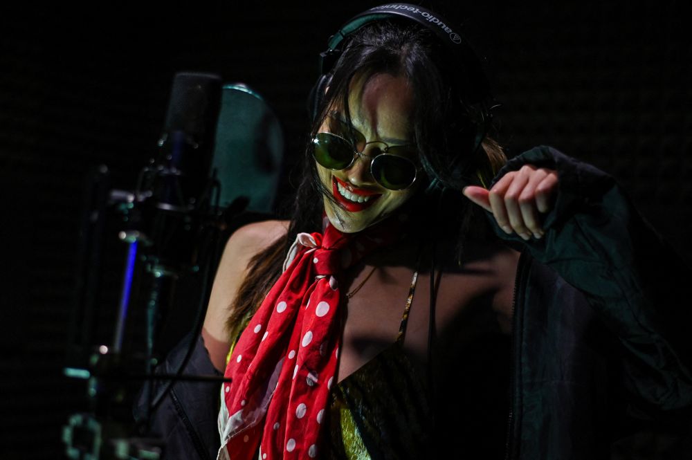 Malaysian hip-hop artist Nur Batrisya Mohammad Nazri, known as SYA, rehearsing after an interview with AFP at a studio in Kuala Lumpur October 9, 2021. u00e2u20acu201d AFP pic