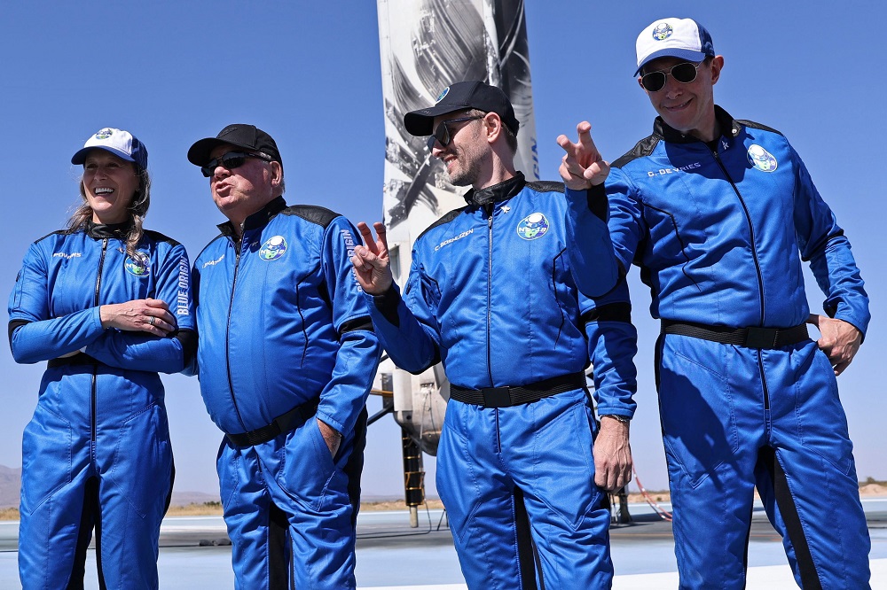 Chris Boshuizen and Glen de Vries gesture after their flight in a capsule powered by Blue Origin's reusable rocket engine New Shepard on a landing pad near Van Horn, Texas October 13, 2021. u00e2u20acu2022 Reuters file pic