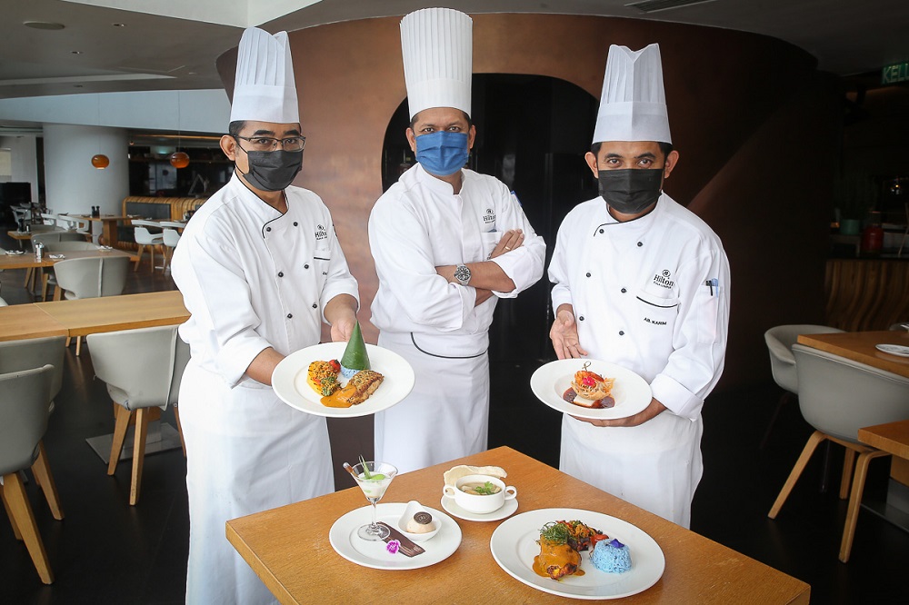 (From left) Hilton Kuala Lumpur Banquet Chef De Cuisine, Jamsari Mohamad, Hilton Kuala Lumpur Executive Chef, Kazi Hassan and Hilton Kuala Lumpur Malay Banquet Sous Chef, Abdul Karim Mustaffa. u00e2u20acu2022 Picture by Yusof Mat Isa