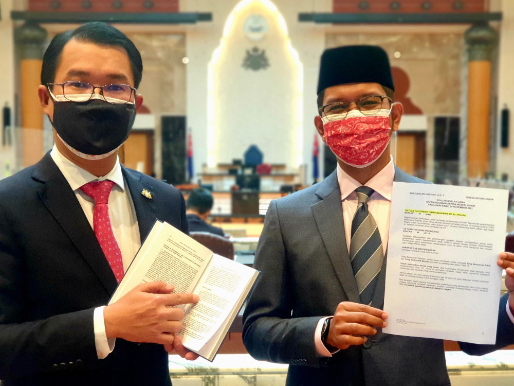 Pakatan Harapanu00e2u20acu2122s Skudai assemblyman Tan Hong Pin (left) and its Paloh counterpart Sheikh Umar Bagharib Ali pose outside the Johor state assembly hall in Kota Iskandar, Iskandar Puteri November 21, 2021. u00e2u20acu201d Picture courtesy of Tan Hong Pin
