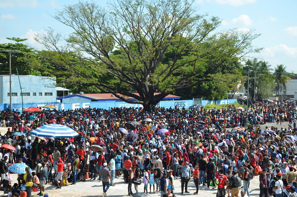Migrants, mostly Haitians, queue outside a stadium to apply for humanitarian visas to be able to cross through Mexican territory to reach the US border, in Tapachula, Mexico November 22, 2021. ― Reuters pic