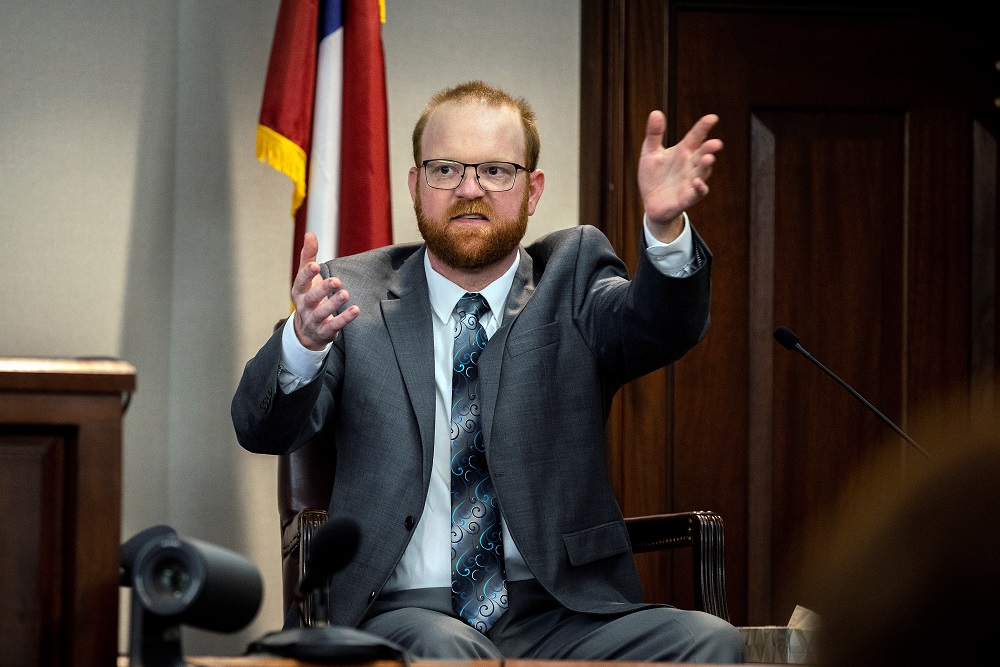 Travis McMichael speaks from the witness stand as the murder trial over the killing of Ahmaud Arbery continues, in Brunswick, Georgia, US November 17, 2021. u00e2u20acu2022 Stephen B. Morton/Pool via Reuters