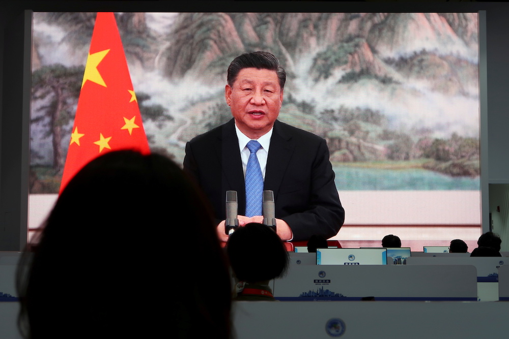 Chinese President Xi Jinping is seen on a giant screen at a media centre as he delivers a speech via video at the opening ceremony of the China International Import Expo in Shanghai, China November 4, 2021. u00e2u20acu201d Reuters picnnn