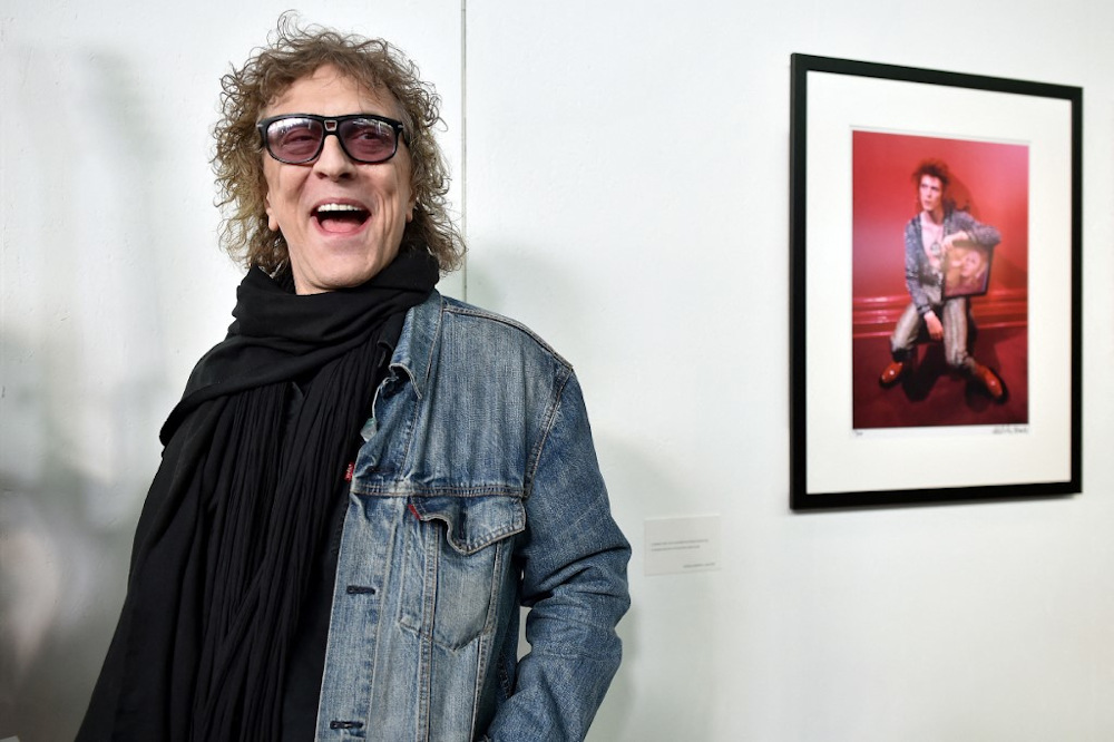 In this file photo taken on December 1, 2016, British photographer Mick Rock poses for a photograph during his exhibition u00e2u20acu02dcLife on Marsu00e2u20acu2122, on David Bowieu00e2u20acu2122s Ziggy Stardust years, at the u00e2u20acu02dcLe Multipleu00e2u20acu2122 exhibition hall in Toulouse. u00e2u20acu201d AFP pic