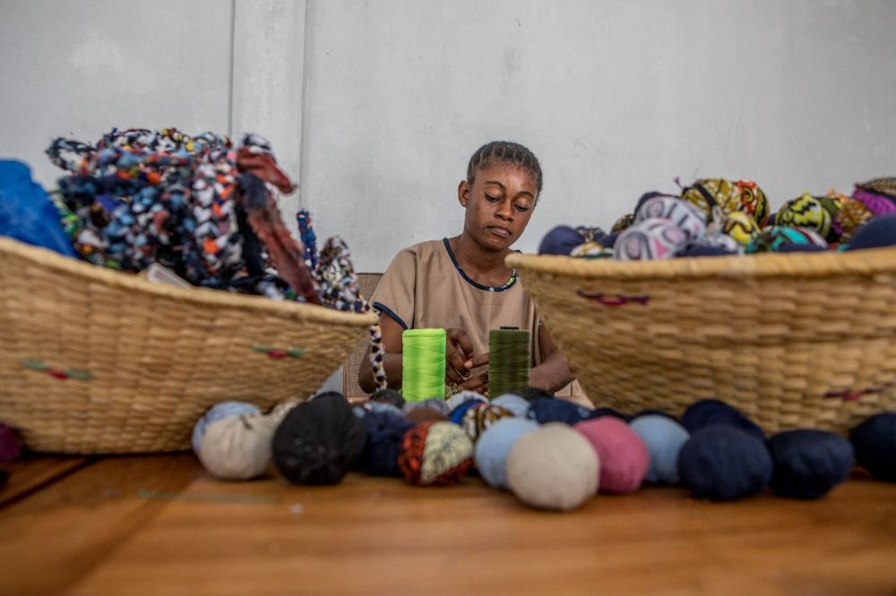 Items are made at Colour Indigo workshop, a project transforming waste fabric into decorative objects, in Ouidah on October 12, 2021. u00e2u20acu201d AFP pic