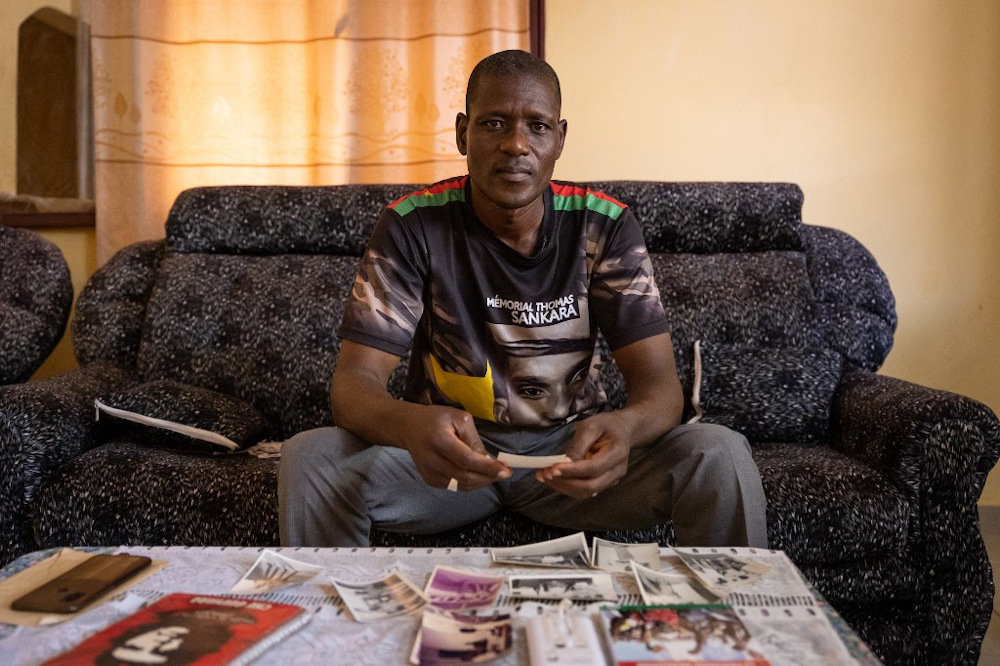 Stanislas Damiba, association of former students trained in Cubau00e2u20acu2122s president, looks at old photos of Cuba, in Ouagadougou, on November 5, 2021. u00e2u20acu201d AFP pic