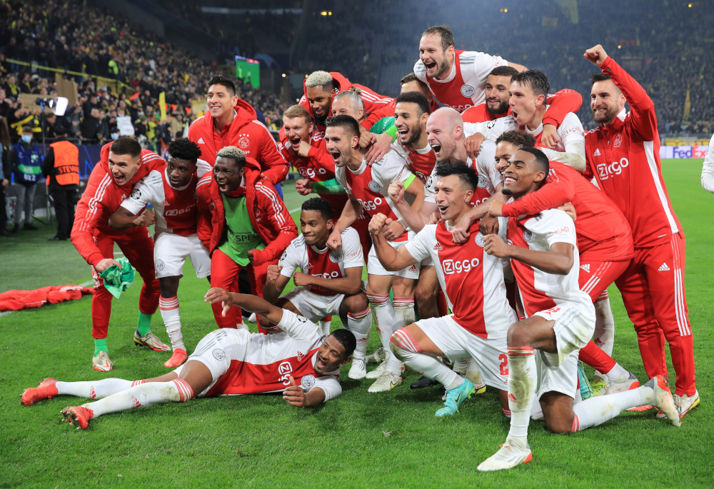 Ajax Amsterdam players celebrate after the Champions League Group C match against Borussia Dortmund at Signal Iduna Park, Dortmund, Germany, November 3, 2021. u00e2u20acu201d Reuters picnn