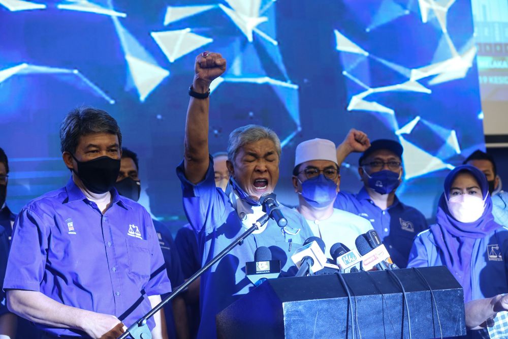 Umno president Datuk Seri Ahmad Zahid Hamidi delivers his speech after Barisan Nasional was declared winner of the Melaka state election in Ayer Keroh November 20, 2021. ― Picture by Ahmad Zamzahuri