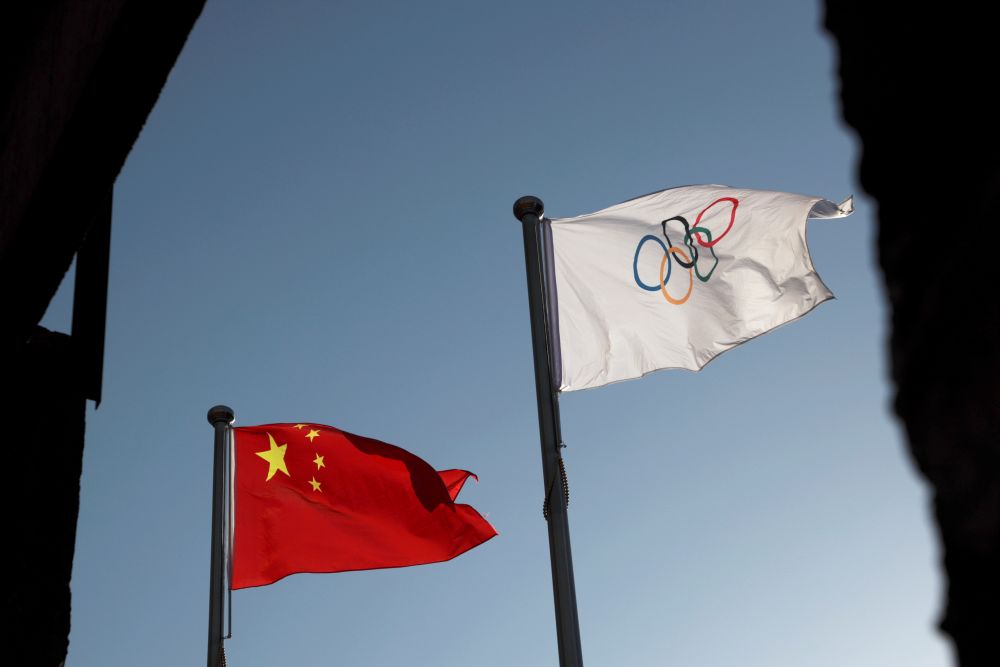The Chinese and Olympic flags flutter at the headquarters of the Beijing Organising Committee for the 2022 Olympic and Paralympic Winter Games in Beijing November 12, 2021.. u00e2u20acu201d Reuters pic