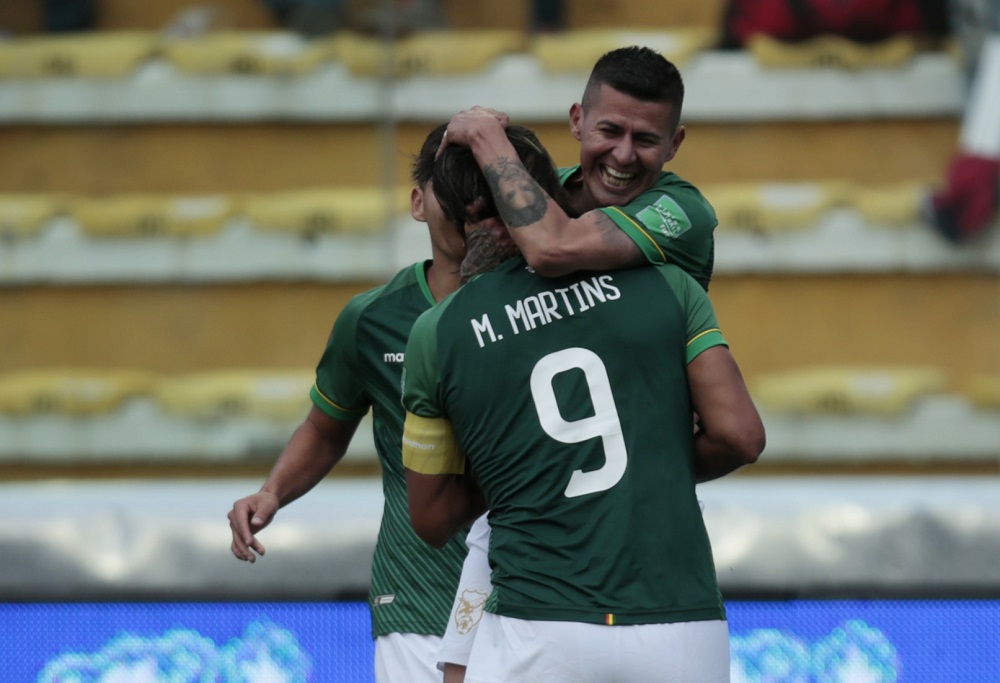 Bolivia's Juan Arce celebrates with Marcelo Martins after scoring their first goal against Uruguay November 16, 2021. u00e2u20acu2022 Reuters pic