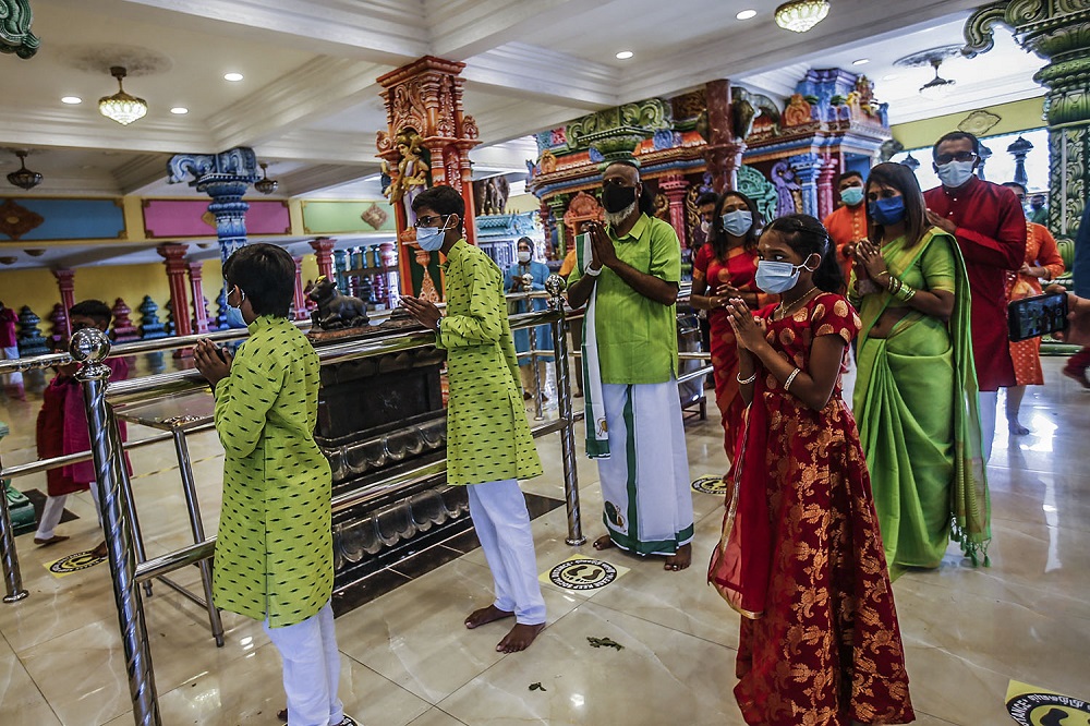 Hindu devotees perform prayers for Deepavali at the Sri Subramaniar Swamy Temple in Batu Caves November 4, 2021. u00e2u20acu2022 Picture by Hari Anggara
