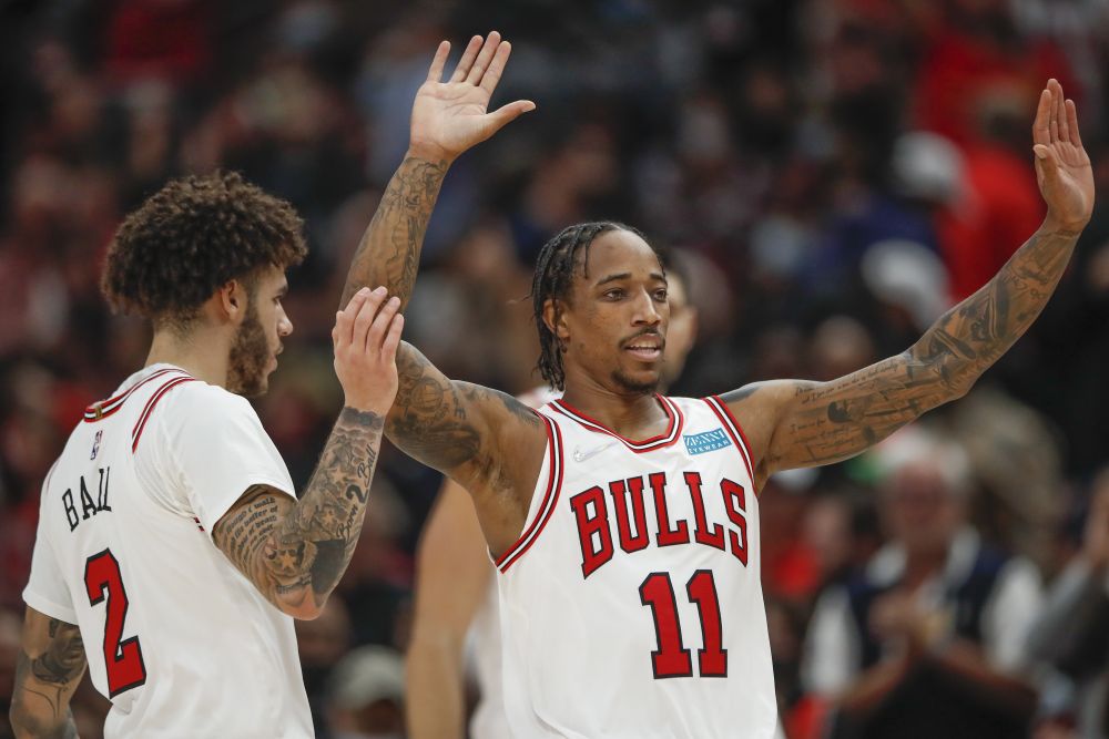 Chicago Bulls forward DeMar DeRozan (11) celebrates with guard Lonzo Ball (2) after scoring against the Brooklyn Nets during the second half at United Centre, Chicago November 8, 2021. u00e2u20acu2022 Reuters pic