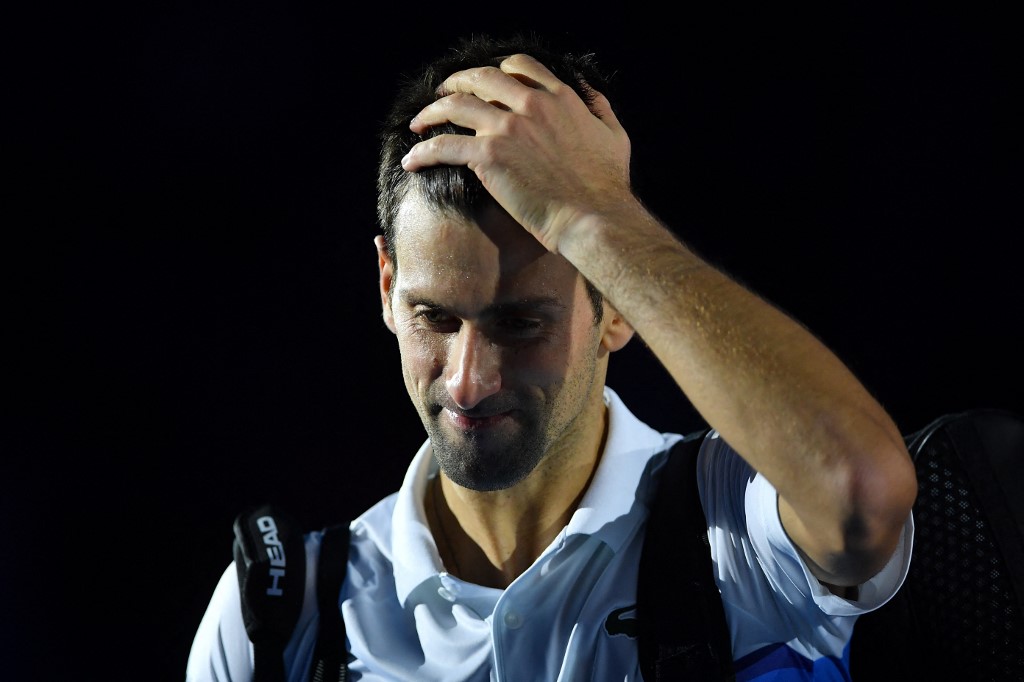 Serbiau00e2u20acu2122s Novak Djokovic reacts as he leaves the court after losing his semi-final match of the ATP Finals against Germanyu00e2u20acu2122s Alexander Zverev at the Pala Alpitour venue in Turin on November 20, 2021. u00e2u20acu201d AFP pic