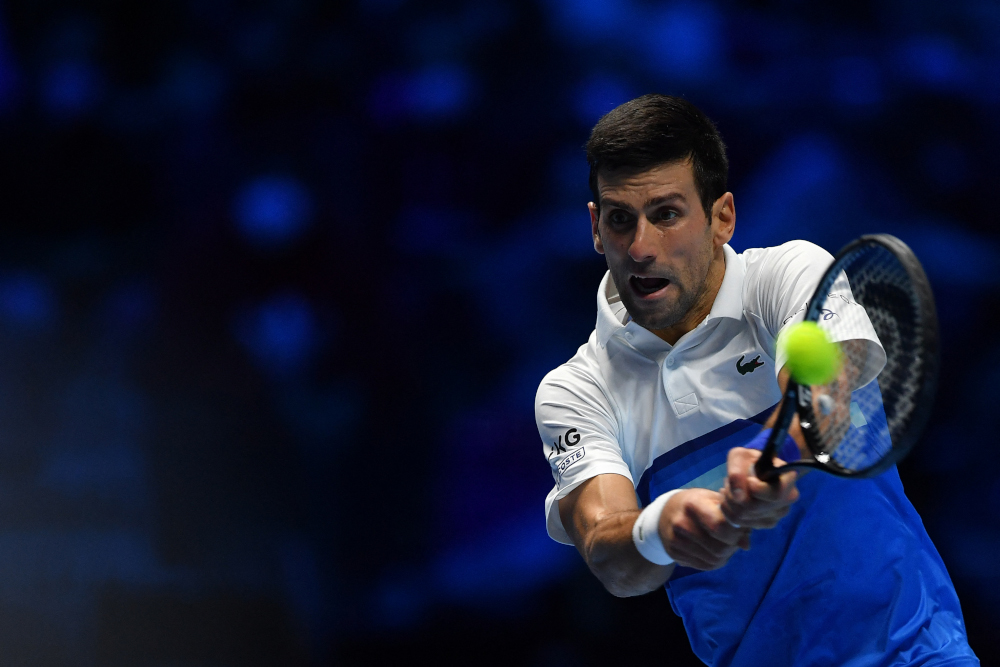 Serbiau00e2u20acu2122s Novak Djokovic returns a shot to Germanyu00e2u20acu2122s Alexander Zverev during their semi-final match of the ATP Finals at the Pala Alpitour venue in Turin, November 20, 2021. u00e2u20acu201d AFP pic 