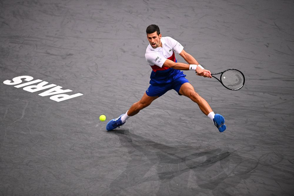Serbia's Novak Djokovic returns the ball to Hungary's Marton Fucsovics during their men's singles tennis match on day two of the ATP Paris Masters at The AccorHotels Arena in Paris on November 2, 2021. u00e2u20acu201d Reuters pic